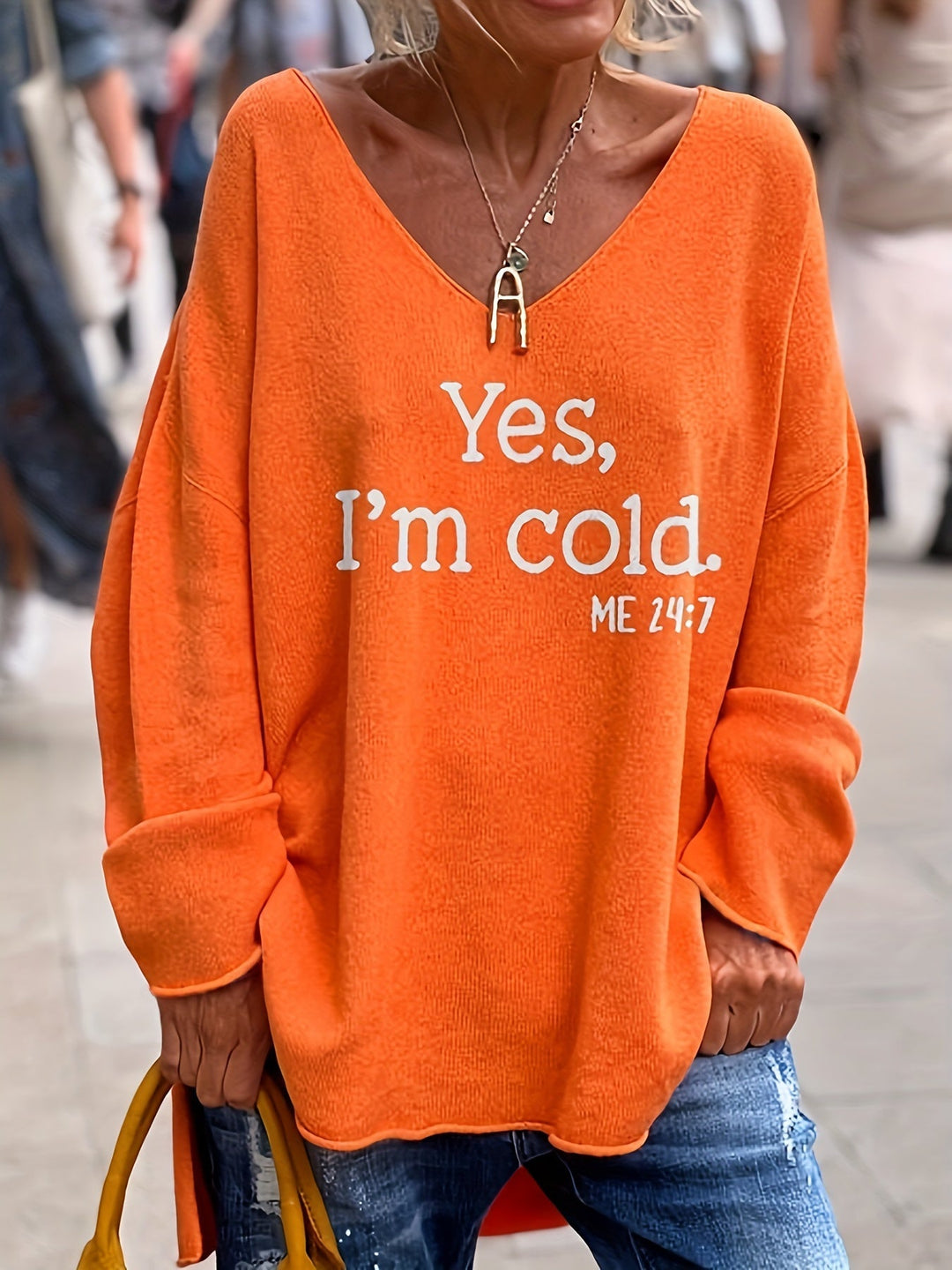 Damski oversize sweter z dekoltem w serek i wzorem – Alenia