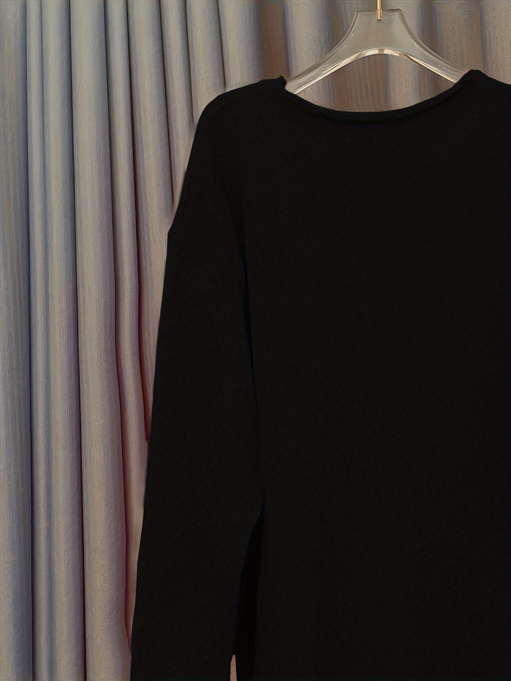 Damski oversize sweter z dekoltem w serek i wzorem – Alenia