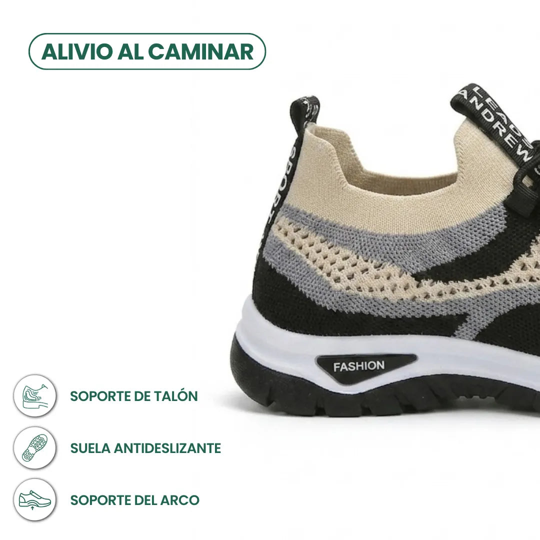 Tył beżowo-czarnego sneakersa z szarą siateczką i czarną podeszwą, z opisem wsparcia pięty, antypoślizgowej podeszwy i podparcia łuku. 40