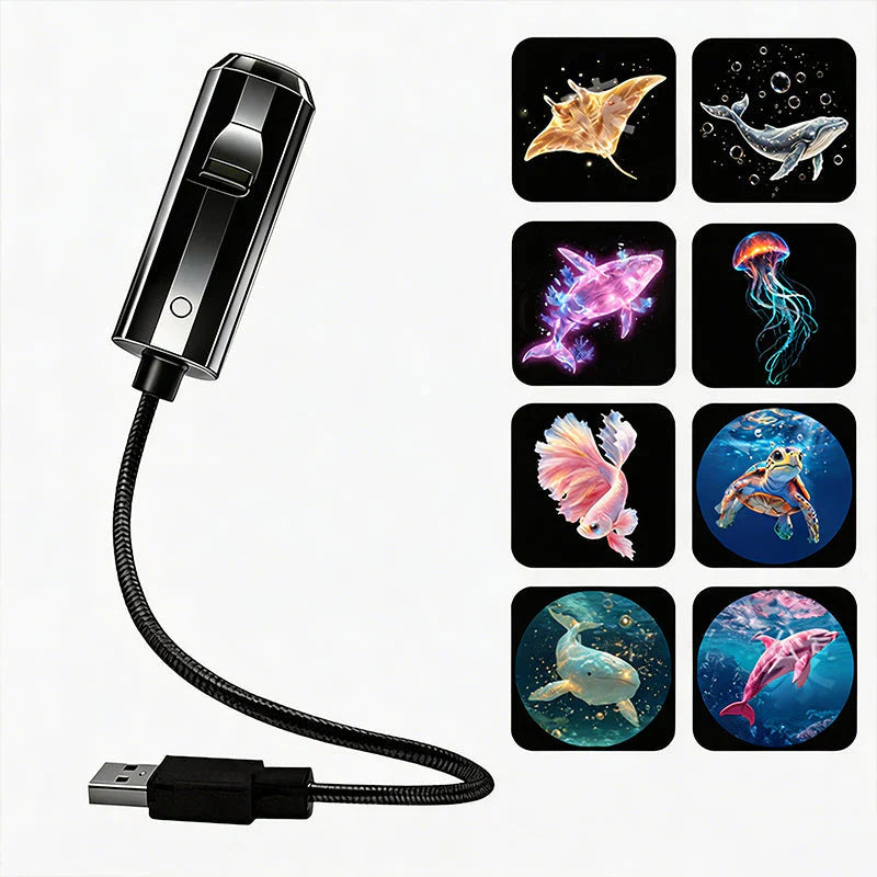 Czarny projektor z giętkim ramieniem i wtyczką USB obok ośmiu miniatur: manta, wieloryb, meduza, żółw, delfin 8