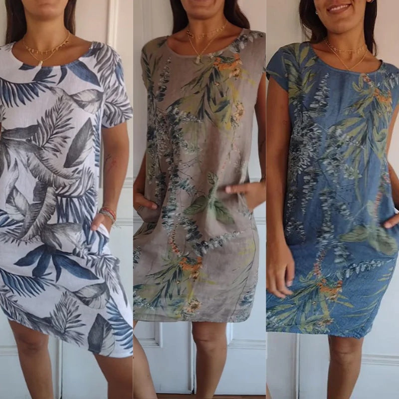 Botaniczna letnia sukienka z okrągłym dekoltem i kwiatowym krojem w kształcie litery A – Elvira-Biały-S-Trend Polska