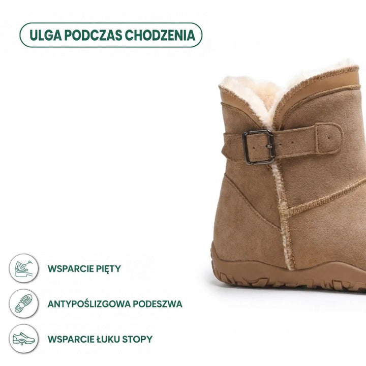 Fragment piaskowego zamszowego buta z klamrą i futerkiem, obok ikony zalet: wsparcie pięty i podeszwa antypoślizgowa 22