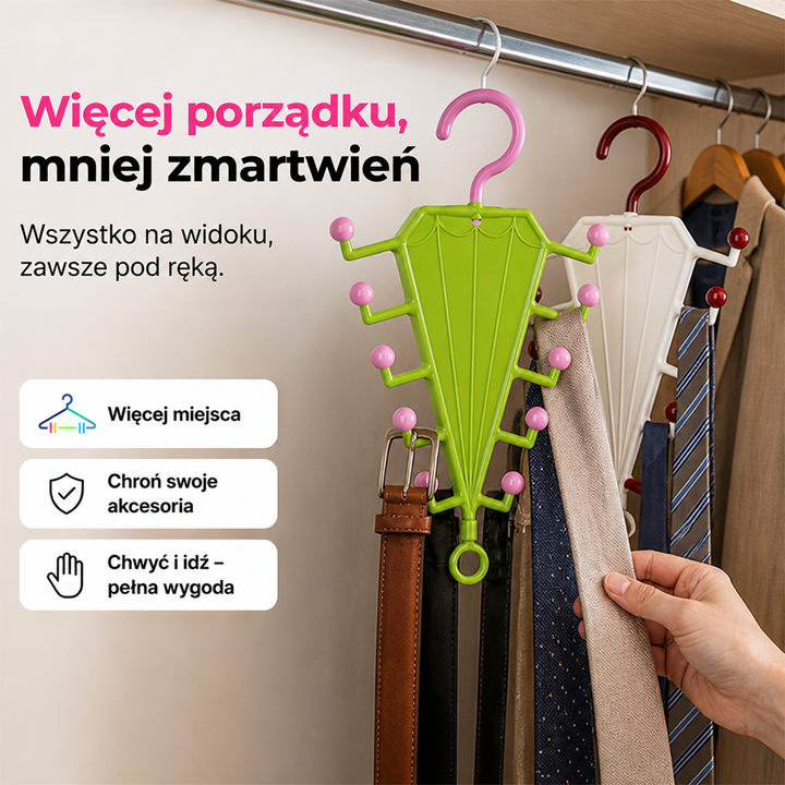 Zielony i biały wieszak na drążku, na którym wiszą paski i krawaty, dłoń sięga po krawat 5