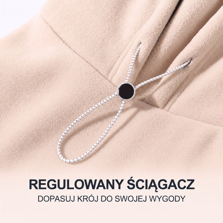 Detal regulowanego sznurka ze stoperem w beżowym polarze, służącego do dopasowania kaptura 5