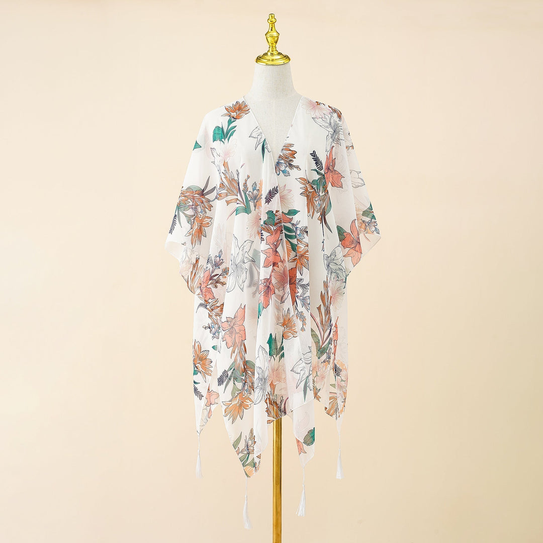 Kimono zakrycie z nadrukiem kwiatowym i frędzlami – Liora-Biała Róża-Trend Polska