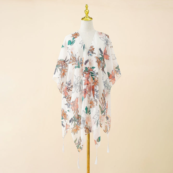 Kimono zakrycie z nadrukiem kwiatowym i frędzlami – Liora-Biała Róża-Trend Polska