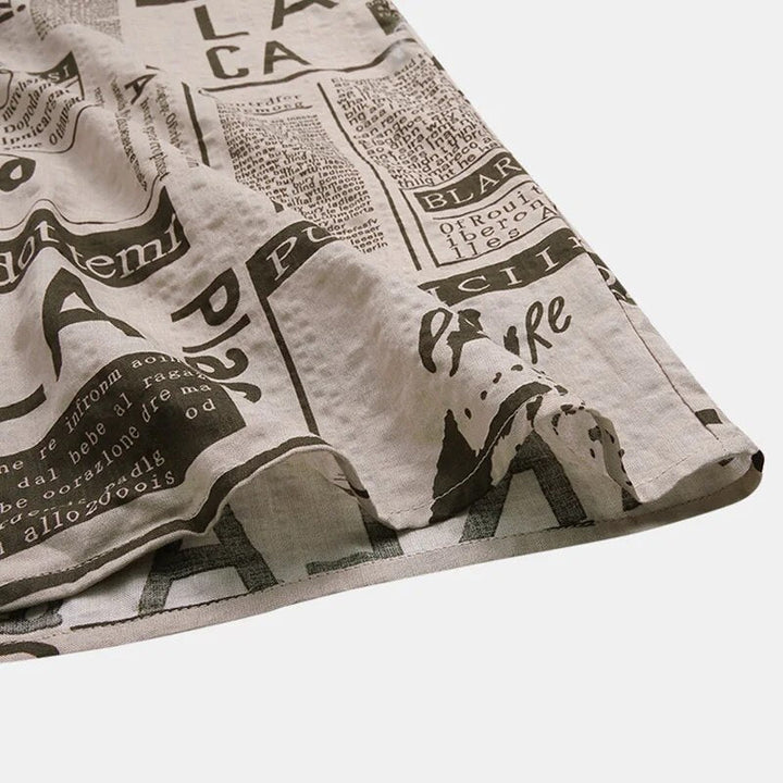 Koszula z nadrukiem gazetowym i zapięciem na guziki - Milo-Czarny-S-Trend Polska