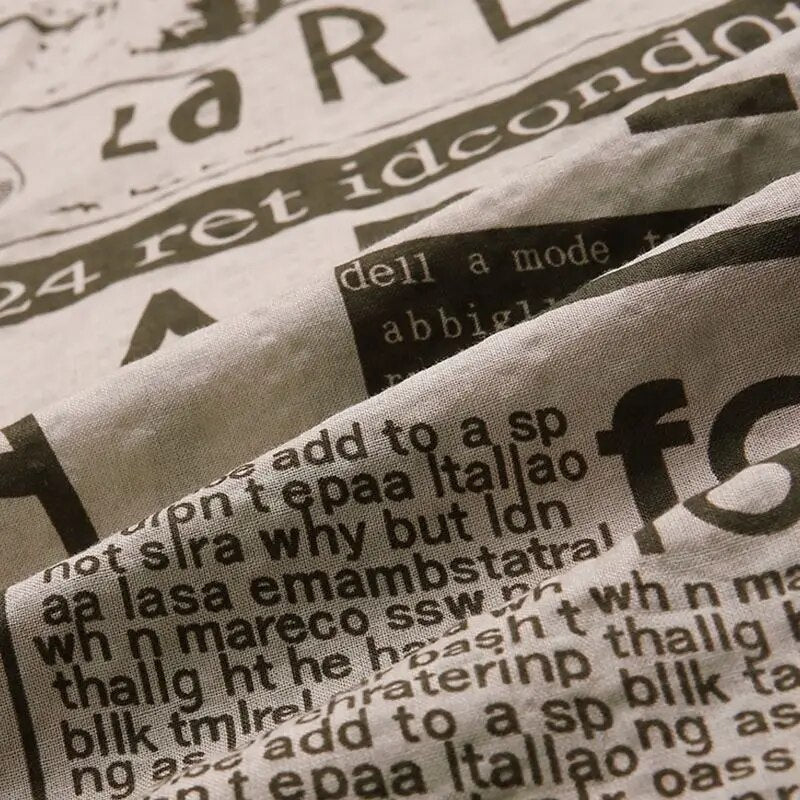 Koszula z nadrukiem gazetowym i zapięciem na guziki - Milo-Czarny-S-Trend Polska