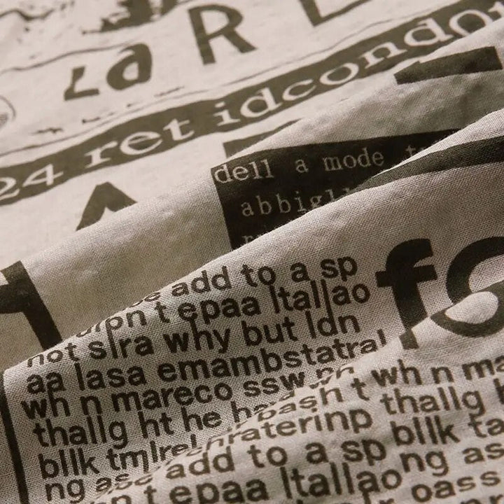 Koszula z nadrukiem gazetowym i zapięciem na guziki - Milo-Czarny-S-Trend Polska