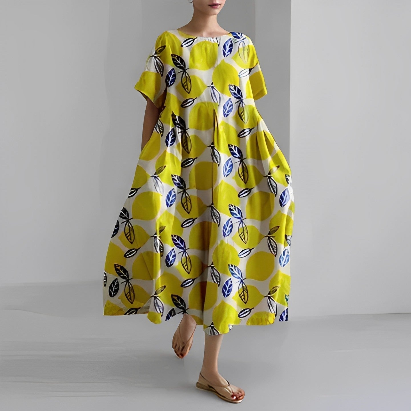 Lekka letnia maxi sukienka z akcentem w talii – Clara-Żółty-S-Trend Polska