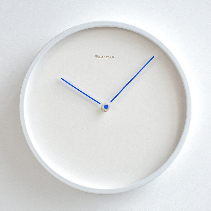 Minimalistyczny skandynawski zegar ścienny - Skara-Niebieski-25cm-Trend Polska