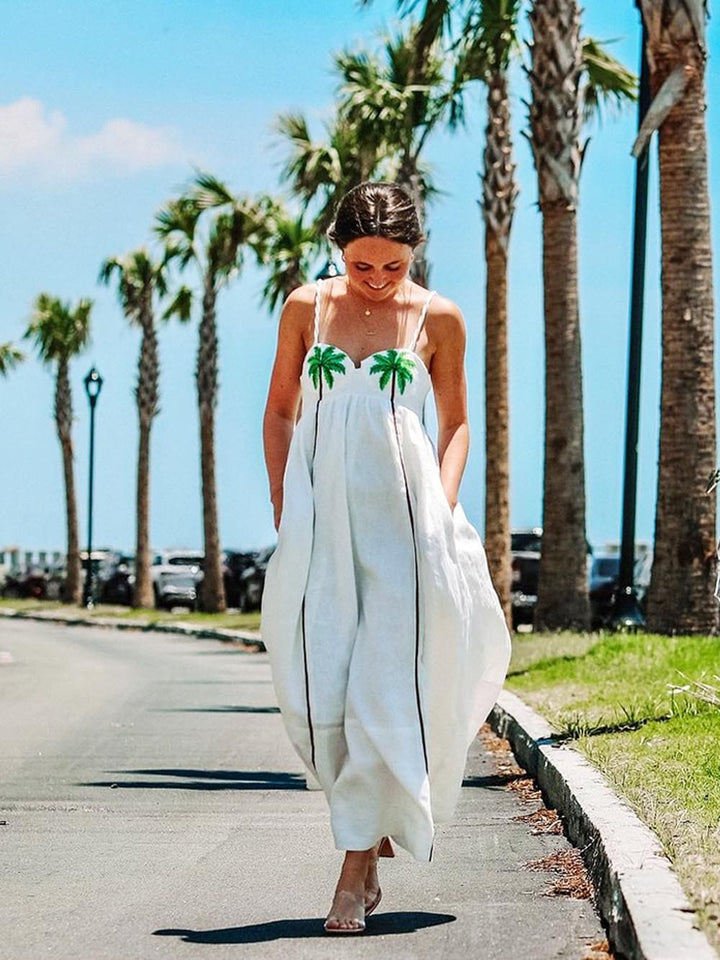 Modna sukienka na ramiączkach z tropikalnym nadrukiem palm – Estelle-S-Trend Polska