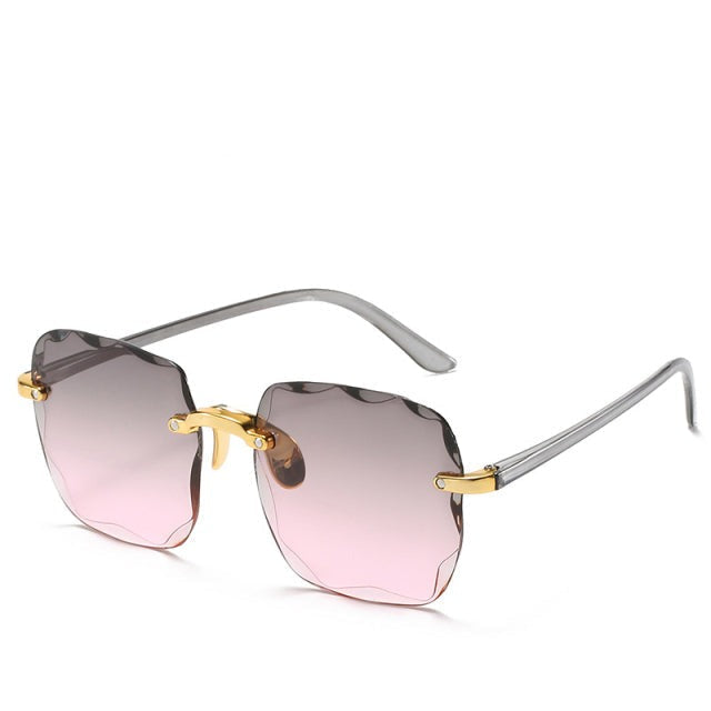 Modne okulary przeciwsłoneczne bez oprawek z ochroną UV400 w vintage'owym stylu – Clea-Szary/Różowy-Trend Polska