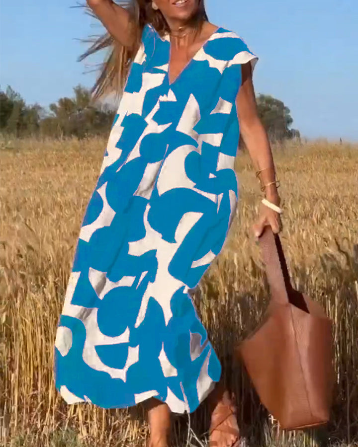 Sukienka maxi z dekoltem V i nadrukiem - Bella-Niebieski-S-Trend Polska