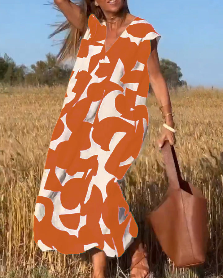 Sukienka maxi z dekoltem V i nadrukiem - Bella-Pomarańczowy-S-Trend Polska