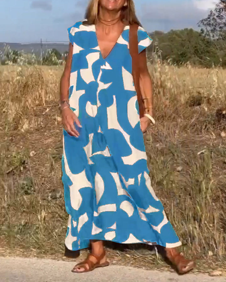 Sukienka maxi z dekoltem V i nadrukiem - Bella-Czarny-S-Trend Polska