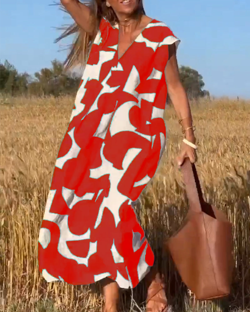 Sukienka maxi z dekoltem V i nadrukiem - Bella-Czarny-S-Trend Polska