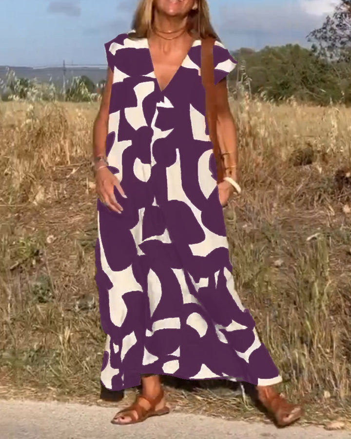 Sukienka maxi z dekoltem V i nadrukiem - Bella-Czarny-S-Trend Polska