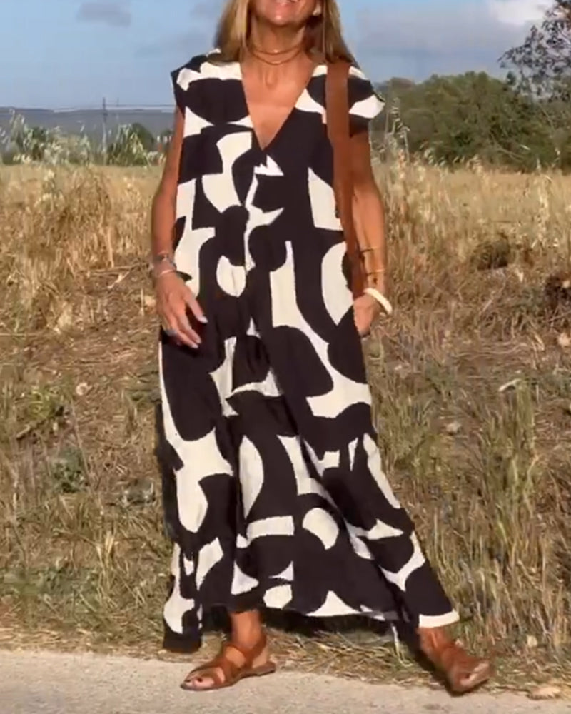 Sukienka maxi z dekoltem V i nadrukiem - Bella-Czarny-S-Trend Polska