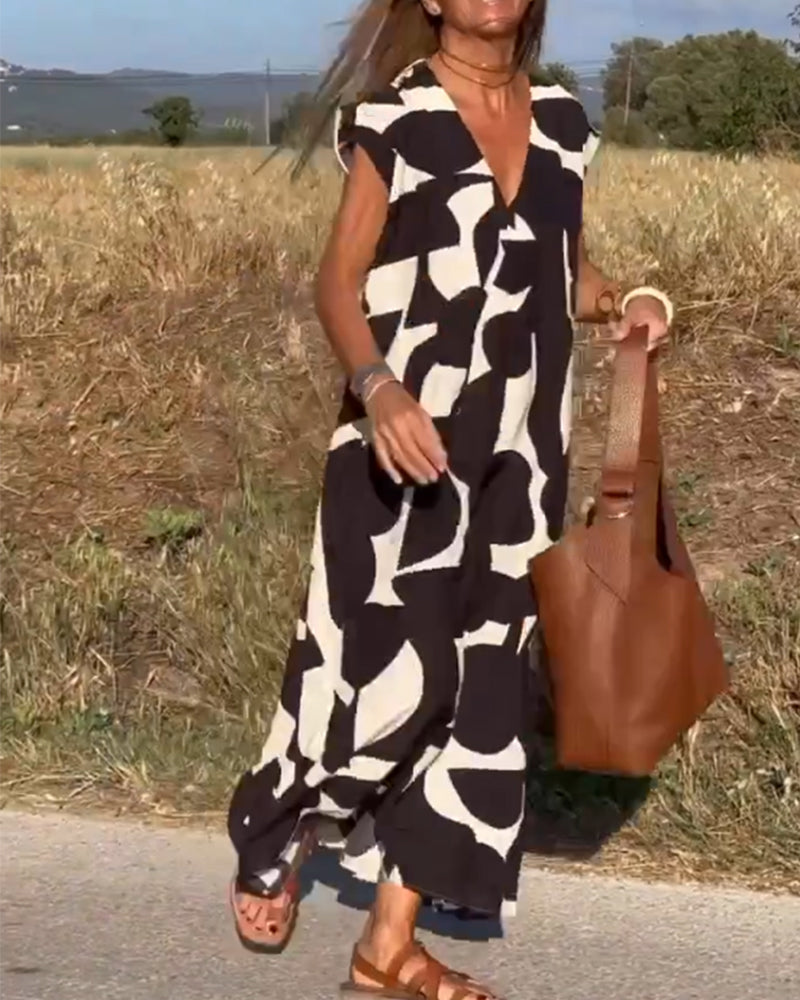 Sukienka maxi z dekoltem V i nadrukiem - Bella-Czarny-S-Trend Polska