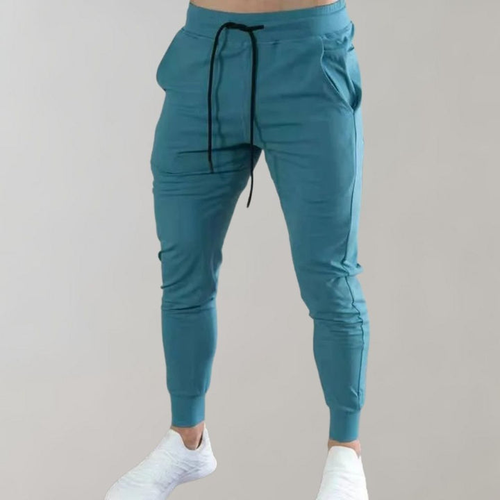 Trendy Slim Fit Spodnie dresowe dla mężczyzn - Niko-Czarny-M-Trend Polska