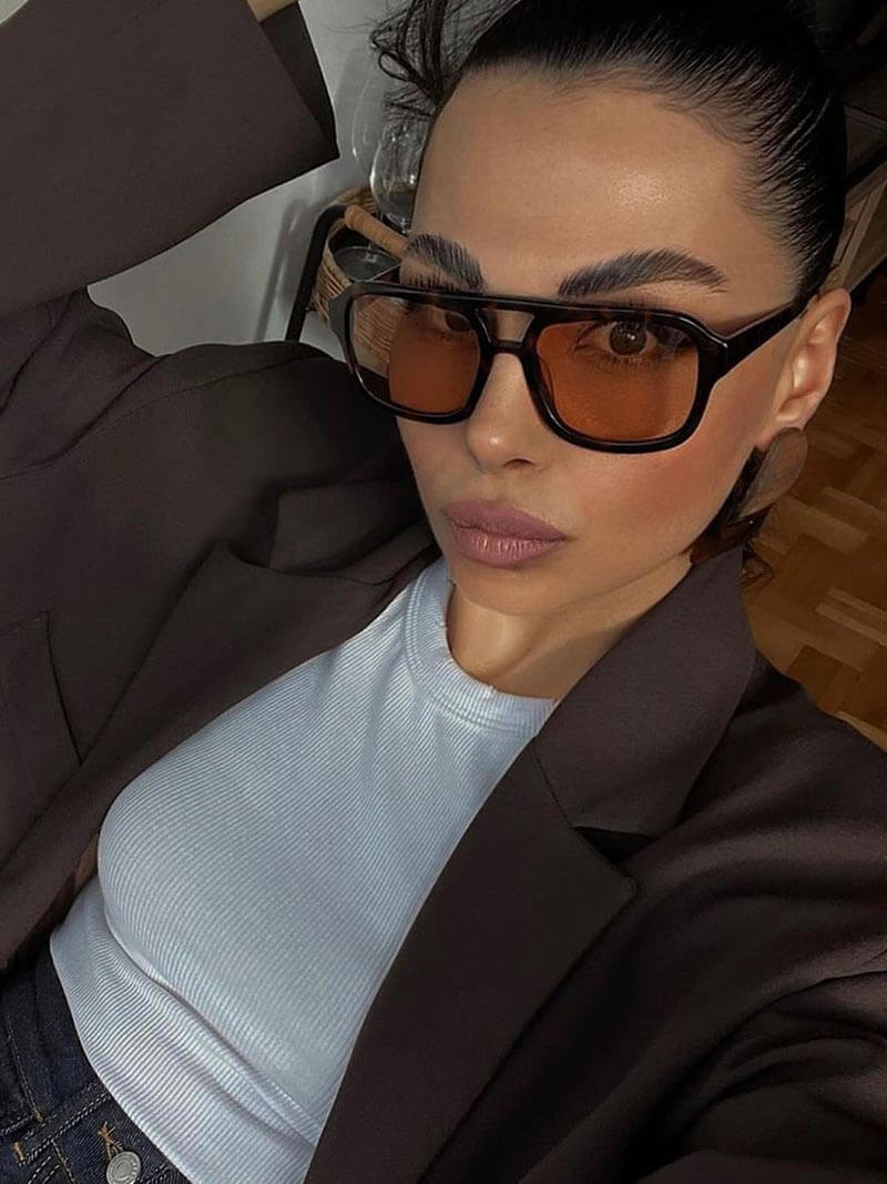 Vintage okulary przeciwsłoneczne z UV i retro urokiem – Loreen-Czarny/Pomarańczowy-Trend Polska