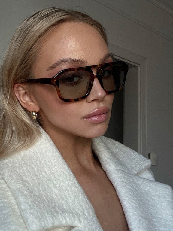 Vintage okulary przeciwsłoneczne z UV i retro urokiem – Loreen-Czarny/Pomarańczowy-Trend Polska