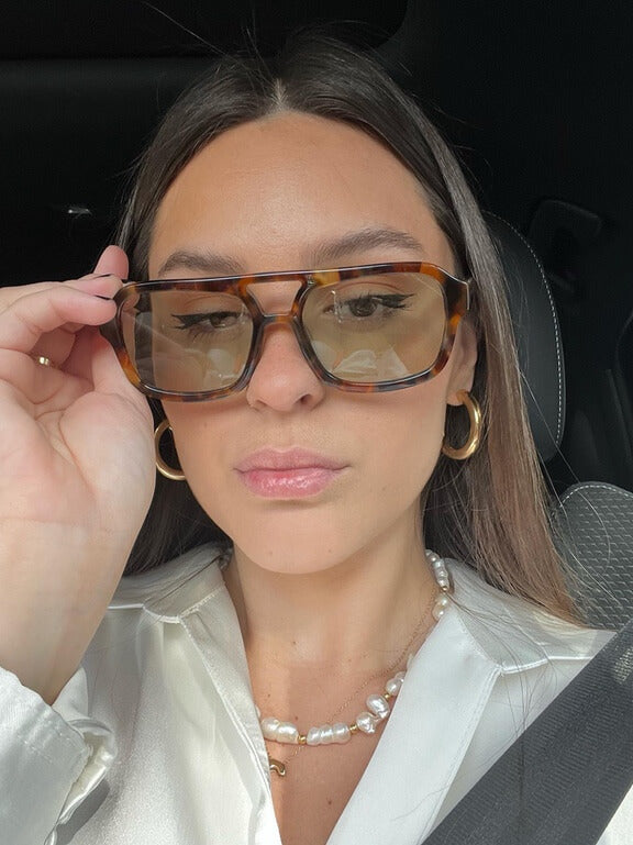 Vintage okulary przeciwsłoneczne z UV i retro urokiem – Loreen-Czarny/Pomarańczowy-Trend Polska
