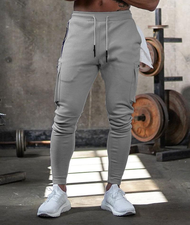 Wygodne męskie spodnie sportowe - Max-Szary-S-Trend Polska
