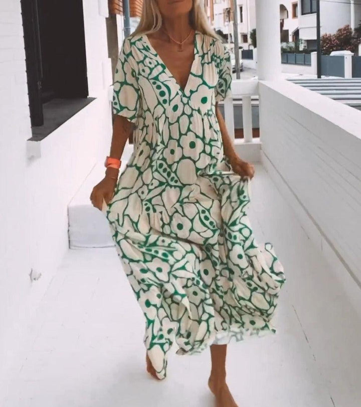 Zielona maxi sukienka z krótkimi rękawami i wzorem – Elisa-XS-Trend Polska